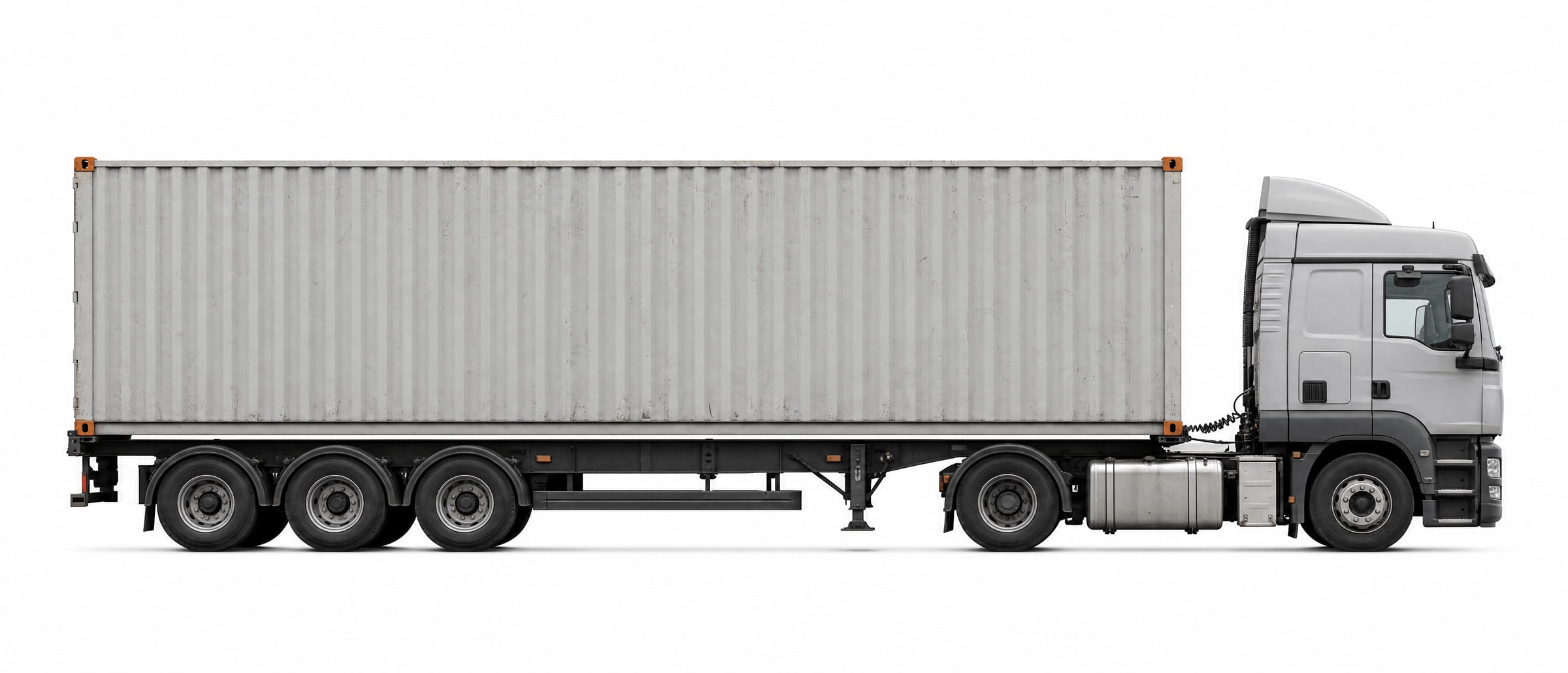Tractor unit and skeletal chassis carrying a 40ft container, side view